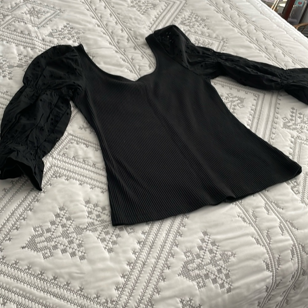 Woman’s black top